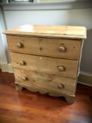 A late Victorian pine three drawer chest, 83 cm x 48 cm x 81 cm.