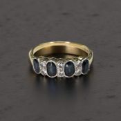 An 18ct gold sapphire and diamond ring, size W CONDITION REPORT: 4.