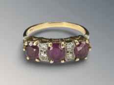 An 18ct gold ruby and diamond ring, size M CONDITION REPORT: 3.