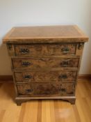 A reproduction yew wood four drawer fold over top chest, 65 cm x 36 cm x 78 cm.