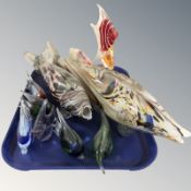 A group of Murano and other glass fish ornaments.