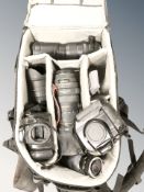 A camera bag containing Canon EOS1000F camera body and a further EOS5 camera body,