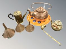 A large copper kettle, height 27 cm, three copper funnels, a brass tea pot, coffee pot, ladle,