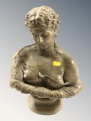 A heavy composition bust of a classical female, height 36 cm.