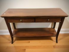 A contemporary stained hardwood two drawer hall table, 120 cm x 40 cm x 76 cm.