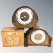 Three Art Deco oak mantel clocks, signed 'Enfield', 'Smiths' and 'Bentima', tallest 23 cm.