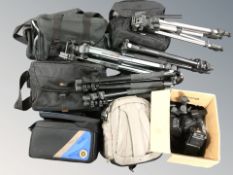 Several camera bags and tripods, photography accessories, etc.