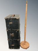 An early 20th century canvas bound trunk, width 90 cm, together with a standard lamp.