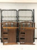 A pair of Edwardian mahogany 3ft bed frames with sprung mattresses.