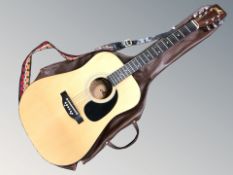 A Mi acoustic guitar made in Korea with carry bag