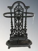 A cast metal umbrella stand, height 54 cm.