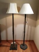 Two 20th century oak standard lamps.