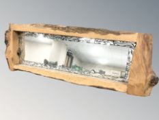 A contemporary rustic wooden framed mirror, 116 cm x 40 cm.