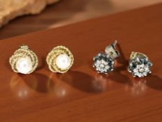 A pair of 9ct gold sapphire and diamond cluster earrings,