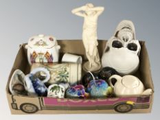 A box of miscellaneous including tin of 1950's candles, composition skull, ceramics,