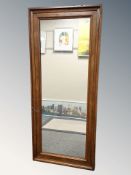 A 19th century mahogany mirror, 64 cm x 147 cm.