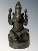 An Indian carved wooden figure of Ganesh, height 24.5 cm.