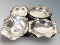 A group of EPNS swing handled baskets.