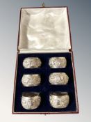A boxed set of six Indian silver napkin rings, stamped 90. CONDITION REPORT: 102.8g.