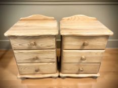 A pair of modern pine three drawer bedside chests, width 47 cm.