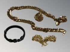 A large gent's gold plated knotted metal ring, a Cuban style necklace, a bracelet with T-bar catch,