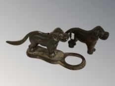 Two metal nutcrackers in the form of dogs, longest 27 cm.