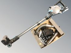 A Vax vacuum cleaner with accessories.