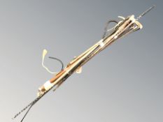 A bundle of riding crops, walking stick, etc.