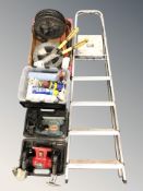An aluminium step ladder, a group of power tool and hand tools including Challenge, other hardware.