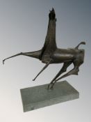 A reproduction modernist bronze figure of a horse on marble rectangular plinth, 66 cm W x 69 cm H.