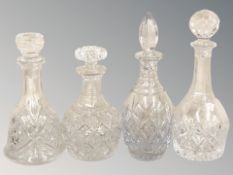 Four various decanters, tallest 30 cm.