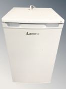 A Lec under bench fridge.