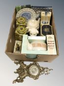 A group of Ringtons tins and other collectibles, an ornate brass mantel clock, etc.
