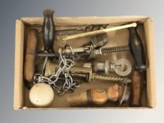 A group of antique corkscrews, figural bottle stopper, golf ball bottle opener, etc.
