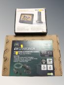 A Sovos portable digital TV in box, and a Masterplug charger in box.