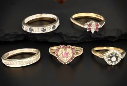 Five 9ct gold rings set with diamonds,