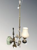 A brass standard lamp, lamp bases, a ceiling light fixture and two enameled metal jars.
