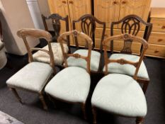 Two pairs of Victorian mahogany dining chairs and two further single chairs.
