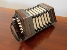 A Lachenal & Co hexagonal 21 key concertina, numbered 40957,