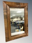 A 19th century continental walnut mirror, 72 cm x 51 cm.