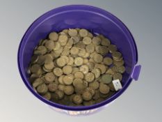 A collection of threepence pieces.