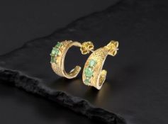 A pair of 9ct gold emerald earrings, with post fittings, length 1.5cm.