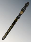 An ebonised police truncheon with later London Constabulary lettering, length 55 cm.