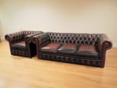 A Chesterfield buttoned leather three seater club settee, 197 cm x 85 cm x 72 cm,