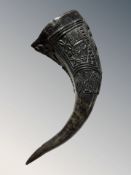 A carved horn, length 26 cm.