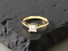 An 18ct gold princess cut diamond ring, the stated diamond weight 0.
