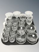 A set of four crystal grapefruit dishes, three further sets of four drinking glasses, etc.
