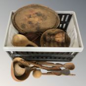 A group of African treen items, wicker baskets, etc.