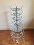 A galvanised metal rack, height 97 cm.