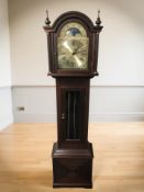 A West German mahogany longcase clock with moon phase dial, with pendulum and weights,
